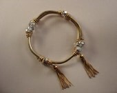 Vintage Unsigned Miram Haskell Coiled Bracelet, Goldtone and Crystals