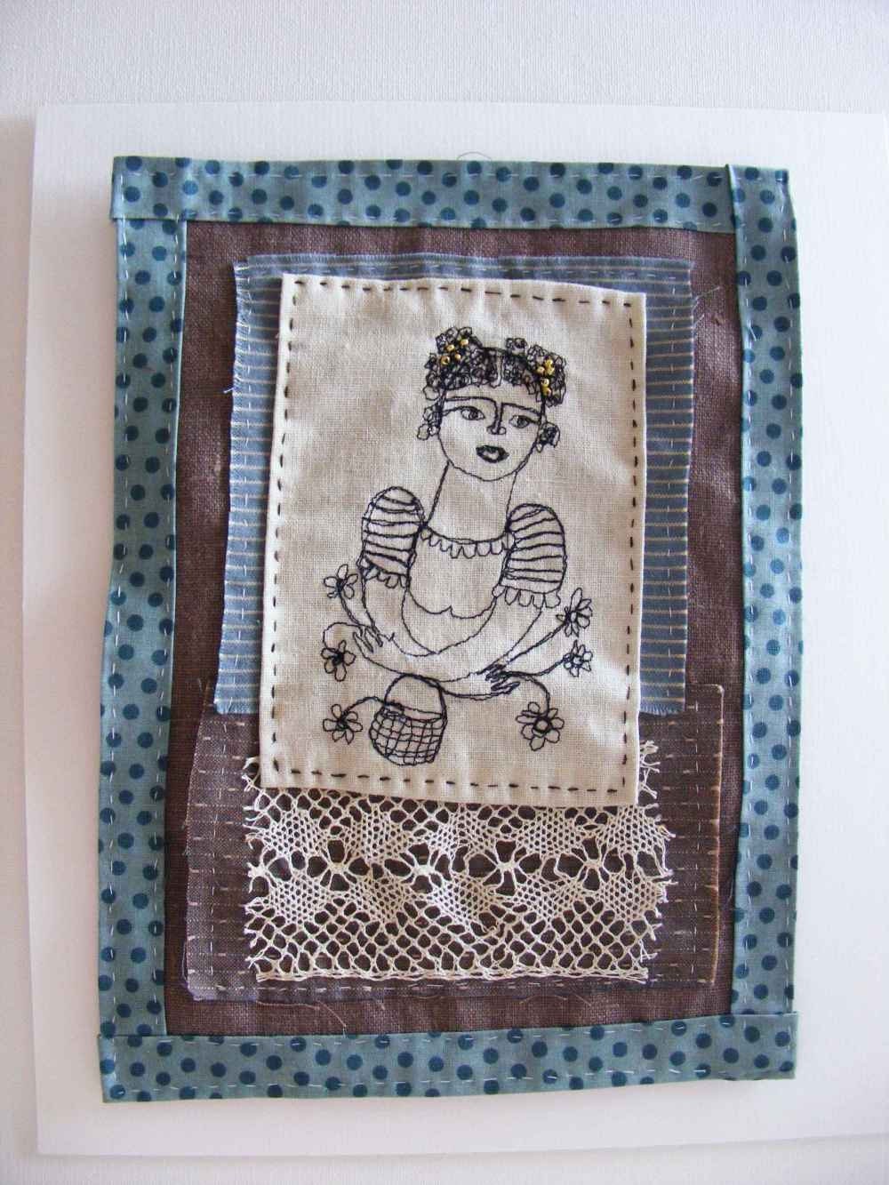 Flowers in my arms- embroidery artwork freestyle and hand stitched portrait