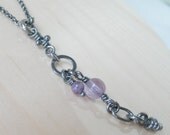 Sterling Silver Amethyst Necklace. Unique whimsical rustic pendant with knots and rings -Story line-