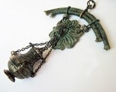 Behind the Veil. Assemblage Pendant with Vial and Verdigris.