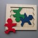 Three Man Puzzle. Looks easy but is very difficult. Only one solution, thousands of possibilities.