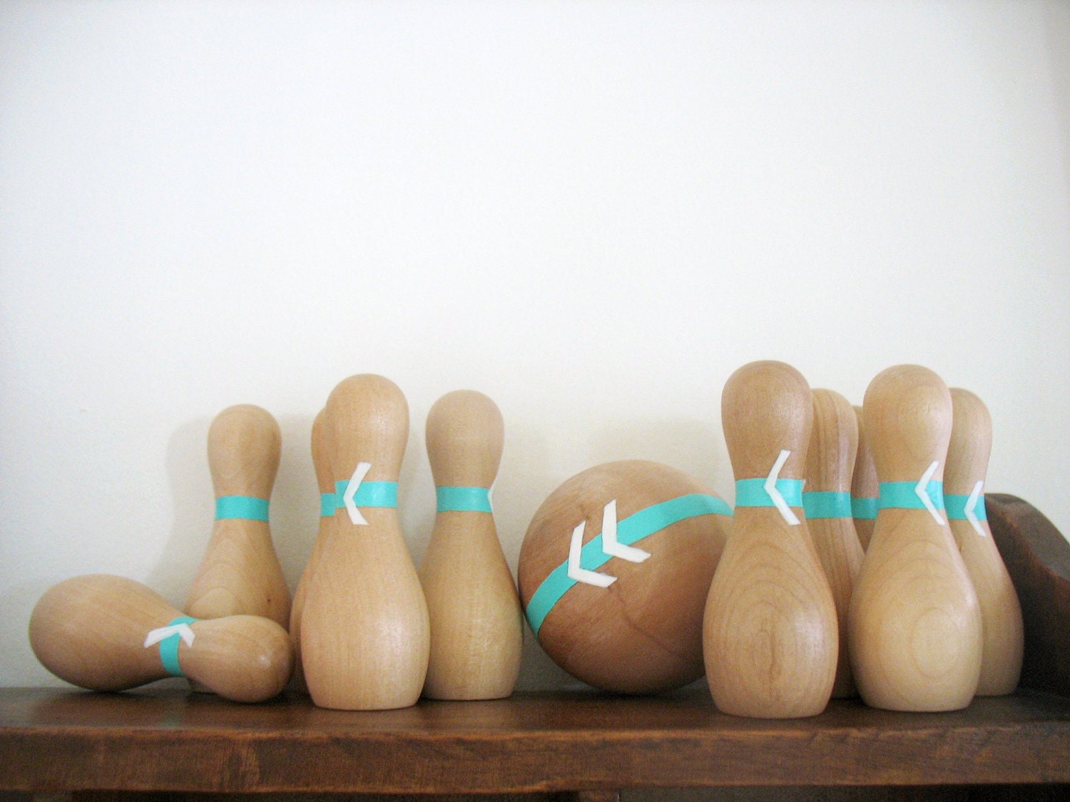 handmade folk art  wooden play bowling set ... turquoise and arrows ( ball and pins )
