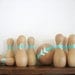 handmade folk art  wooden play bowling set ... turquoise and arrows ( ball and pins )