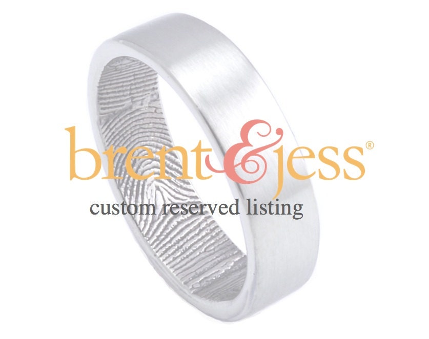 Reserved custom fingerprint wedding ring for adamwinslow