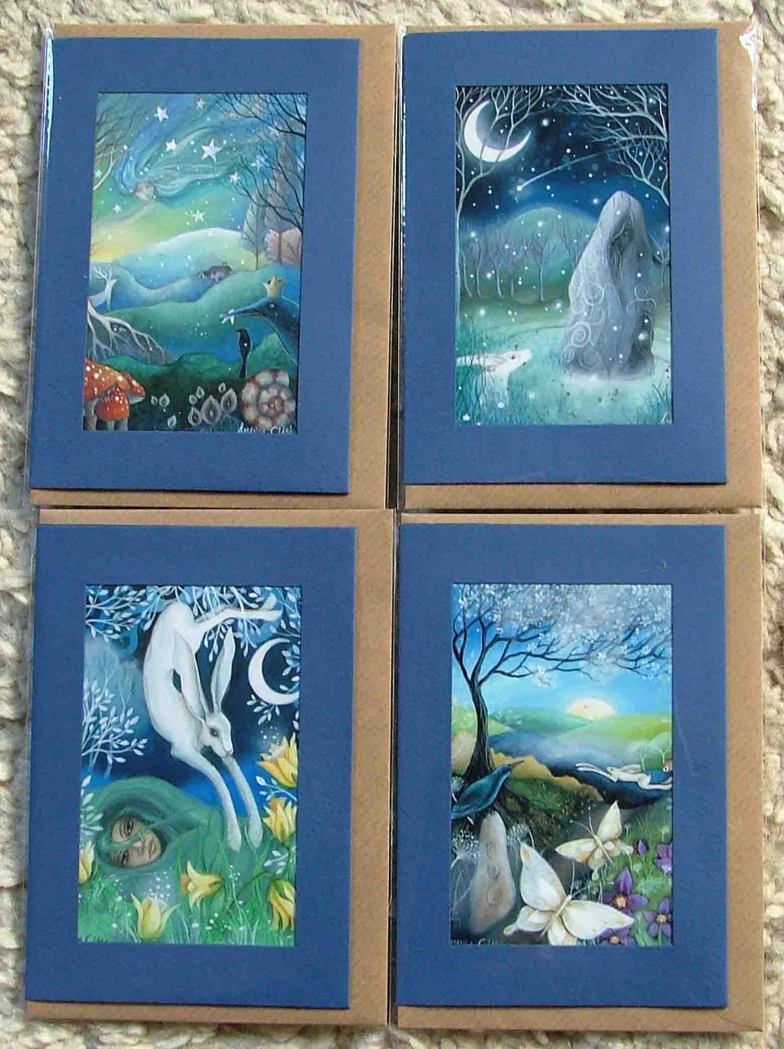 A set of 4  Artist made greeting cards. Theme is Yule, Imbolc, Ostara and Beltane