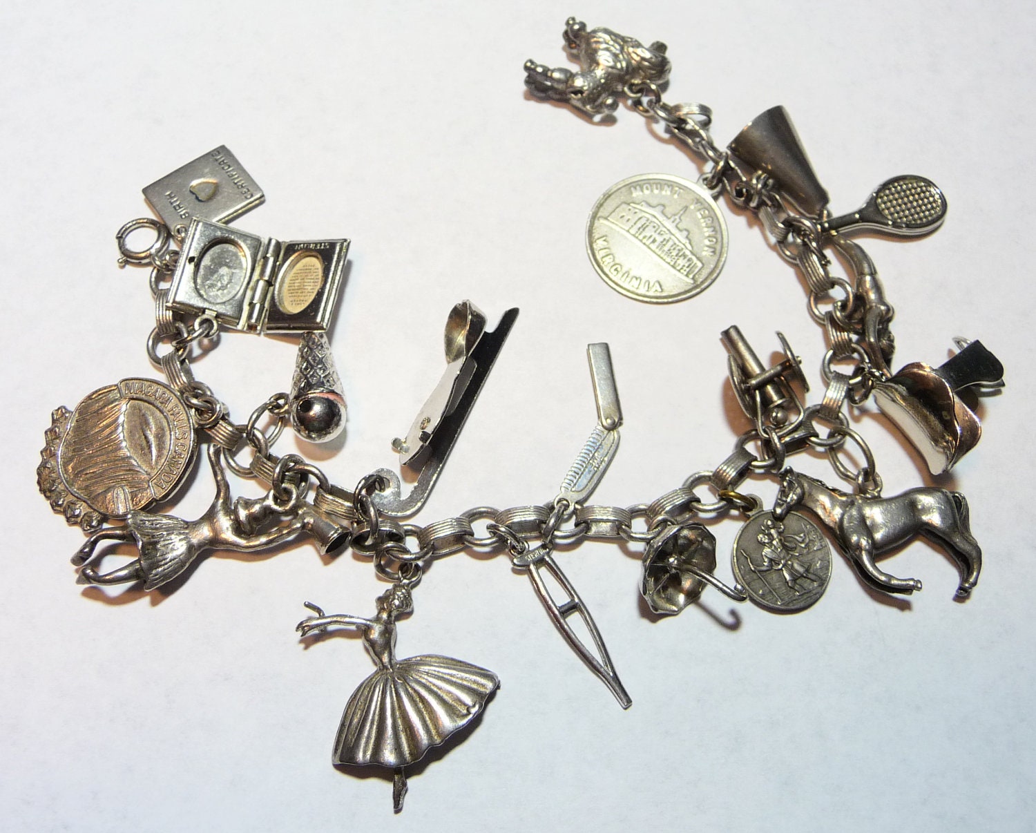 Vintage 1950s Sterling Silver Charm Bracelet on Etsy