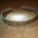 Love you to the moon and back aluminum cuff bracelet with ideograms