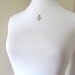 Sterling silver petite oval vintage photo locket, engraved on silver chain, small antique locket