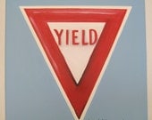 A hand painted yield sign art work for any age