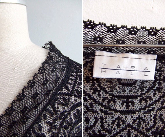 Vintage 1980s designer sheer black lace blouse with fringed detail at cuffs
