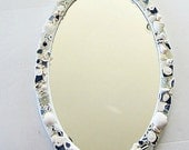 Coastal Home mirror decor sea glass shells pottery blue and white
