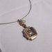 Antique 10k Gold watch case pendant hand place gears on Steel wire screw clasp