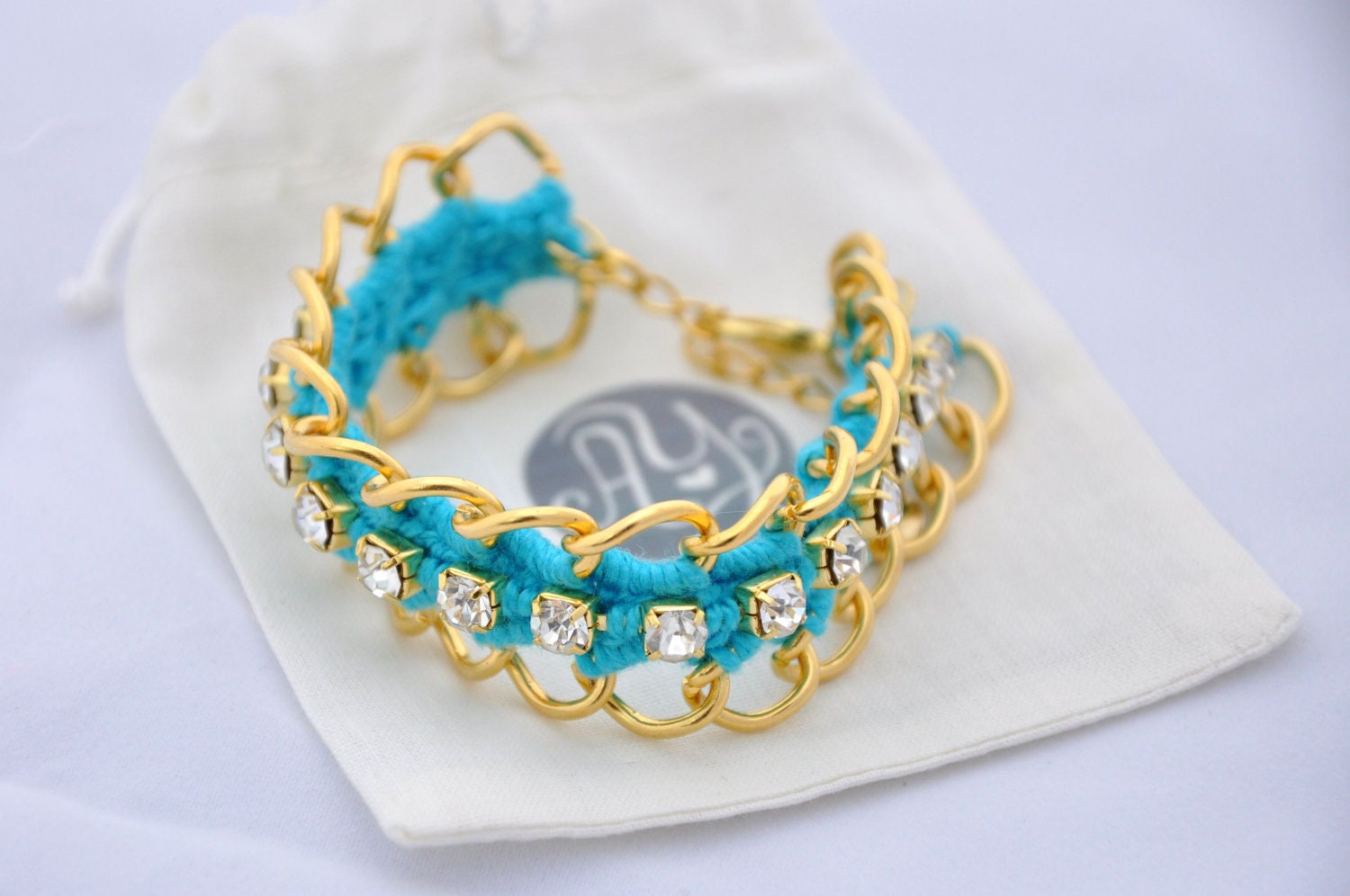 Crocheted Turquoise bracelet in gold Chain