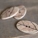 Three woodland porcelain buttons.