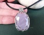 Wire Wrapped Rose Quartz Pendant in Sterling Silver.