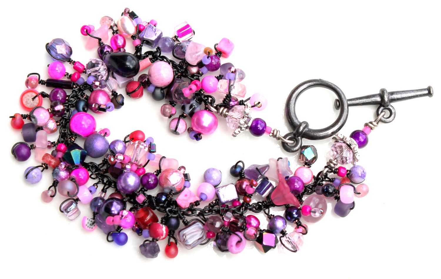 goth girl bracelet. pink and purple beaded jewelry.black wire wraps