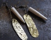 Tribal pair of earrings stamped brass with native inspired patterns arrows and suns and bones beads