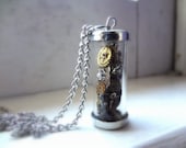 Time Capsule. salvged vial necklace with recycled vintage watch parts