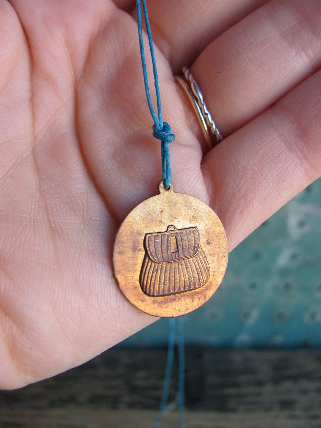 brass fishing creel charm necklace - teal