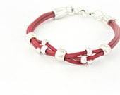 Red leather bracelet with silver color metal beads