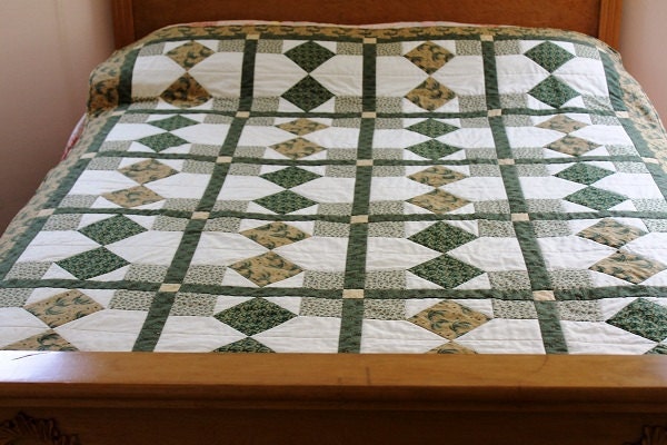 Handsome quilt in Civil War reproduction colors, fabrics, large throw or lap size, reversible