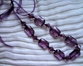 Big crystal & ribbon necklace in Purple