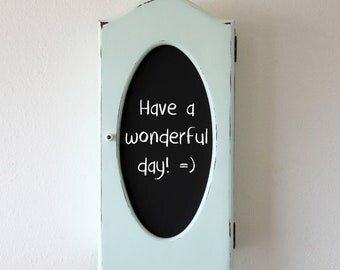 Vintage repurposed pale blue distressed cabinet, with chalkboard