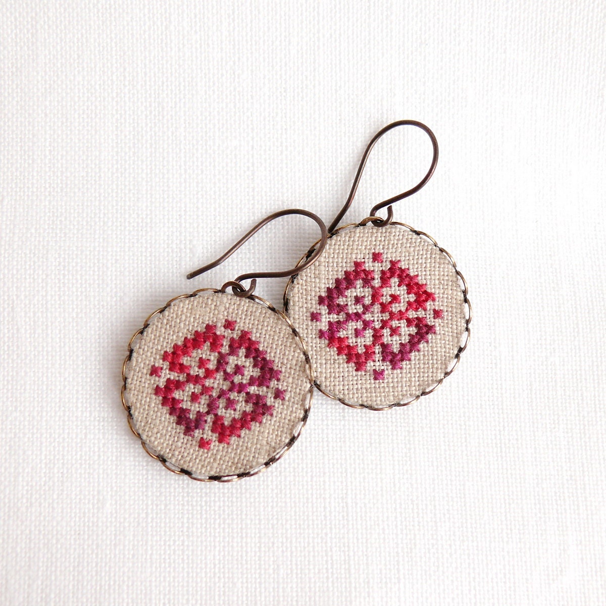 Cross stitch earrings Ethnic ornament in melange red by skrynka