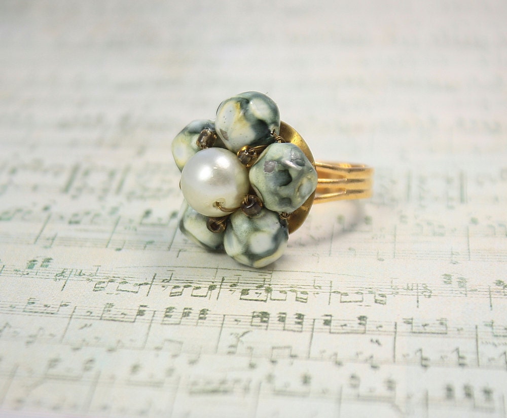 Ring recycled  vintage. Gold tone and adjustable.  Beautiful and one of a kind.