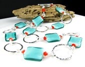 Teal Lampwork Glass Necklace with Hammered Rings