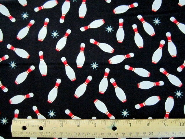 It's A Strike Bowling Pins Tossed on Black by KANVAS for Benartex BTY