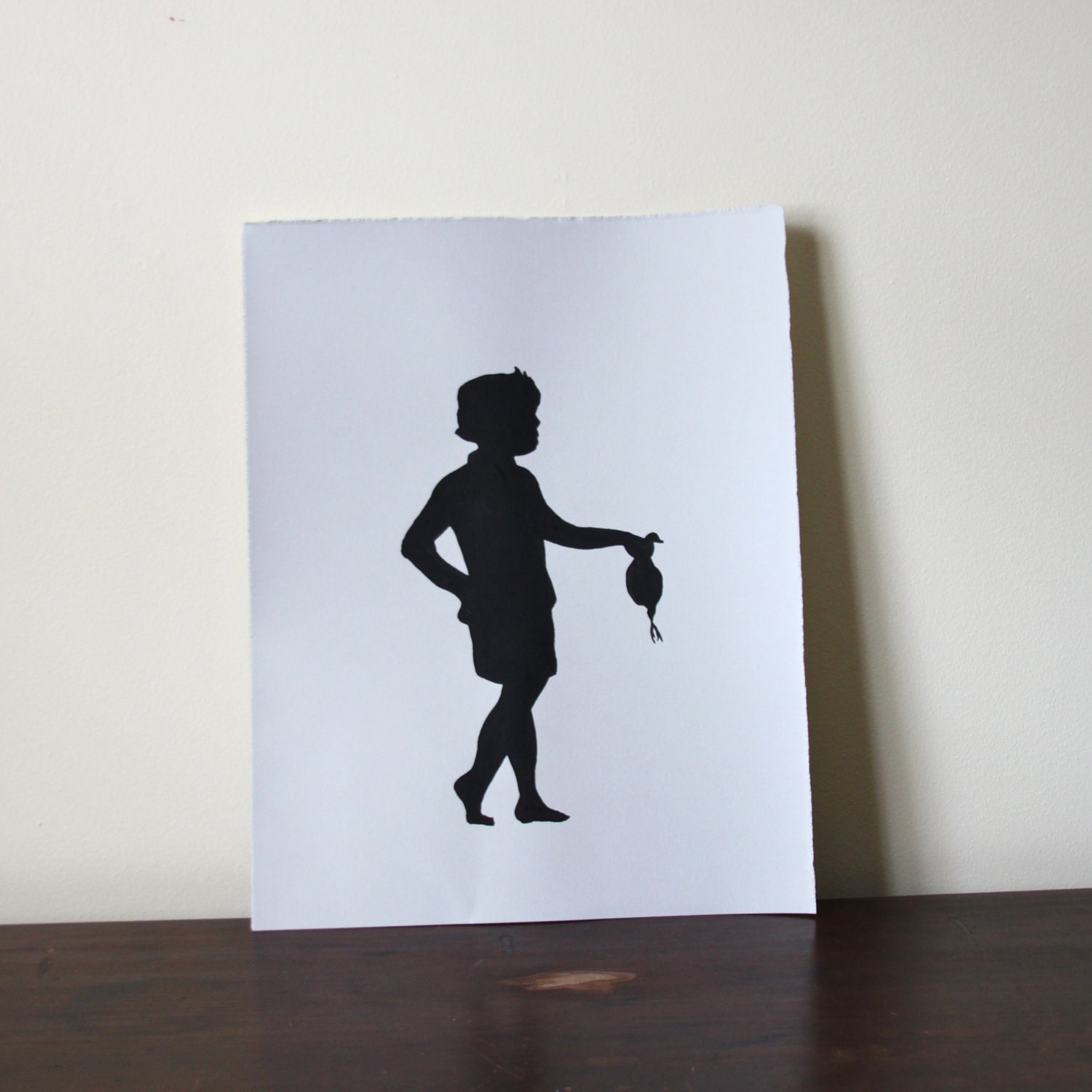 Dandy Bird, original Painting, black silhouettes of a boy and his bird, on grey paper