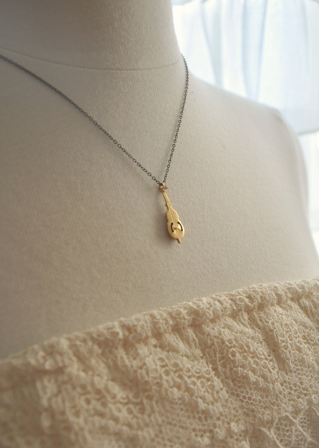 vintage violin necklace.