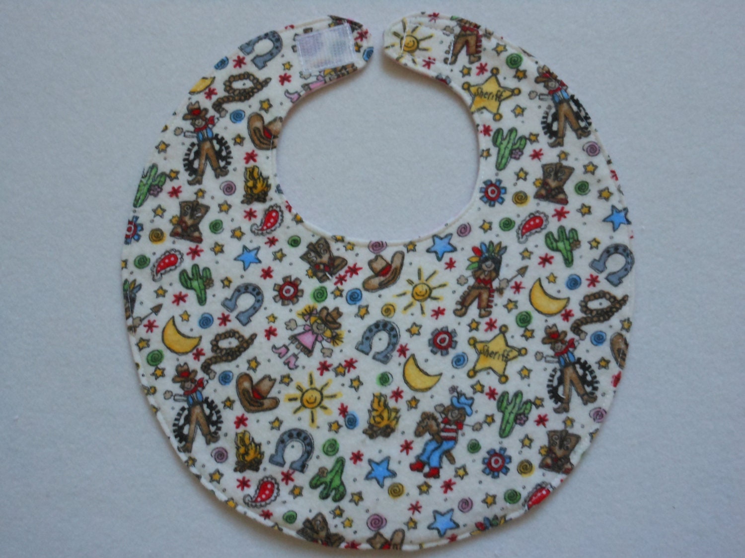Baby bib, four soft layers, cowboys and indians