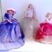 A sweet bride pose doll and her maidens