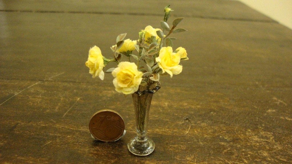 Miniature jug with yellow roses