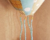 BOObeloobie Hot Air Balloon Mobile in Blue, Red, grey, cream and white with a cute Orli the Owl and fluffy cloud detail