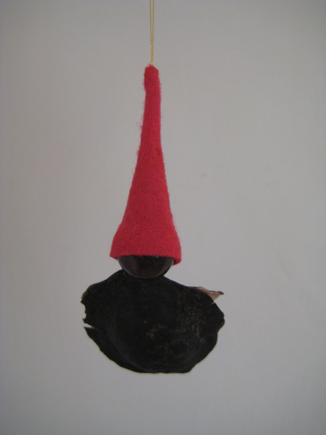 Jacaranda Seedpod ornament, Red Gnome ornament