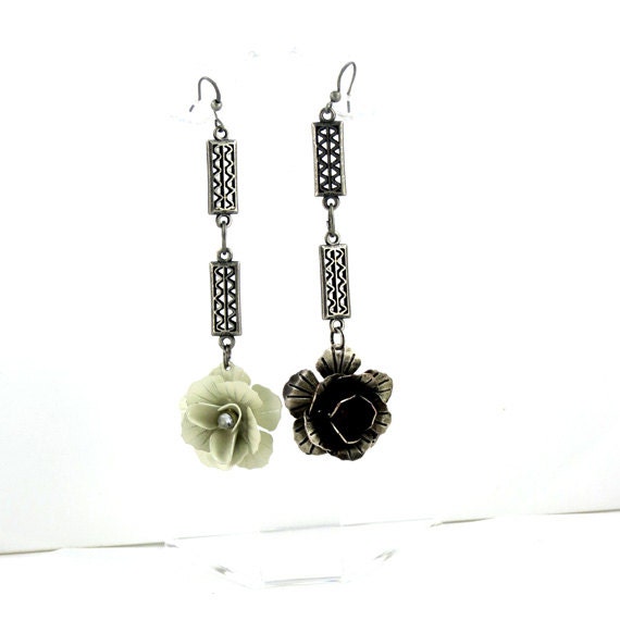 Stylish modern  hip  not matching color earrings. Light weighted.  Fashioniistas,   these earrings for you. Fashion Brand Faina.