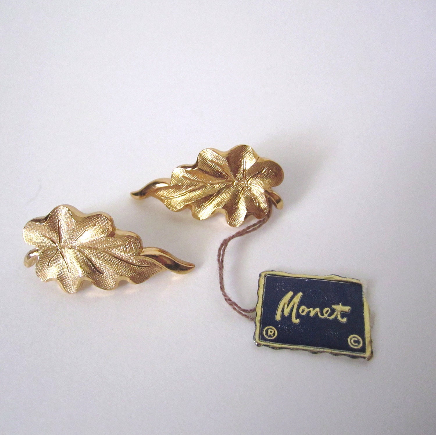 Vintage NOS 1960s MONET Gold Tone Leaf Earrings with Original hang tag  // 60s // clips // clip ons // clipons