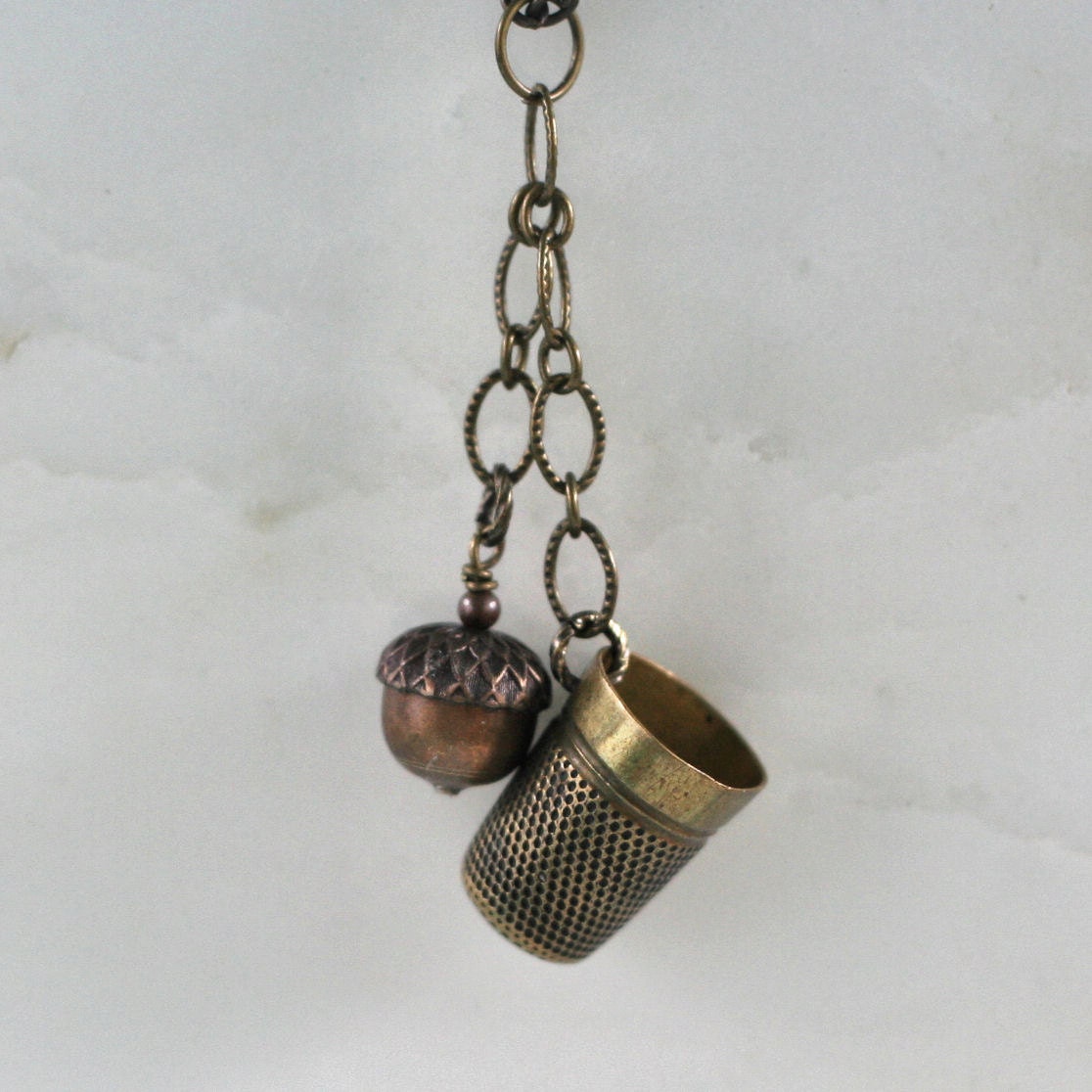 Peter Pan and Wendy Thimble and Acorn Kisses in Aged Brass