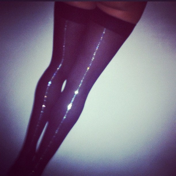 stardust. black thigh highs with dazzled seam.