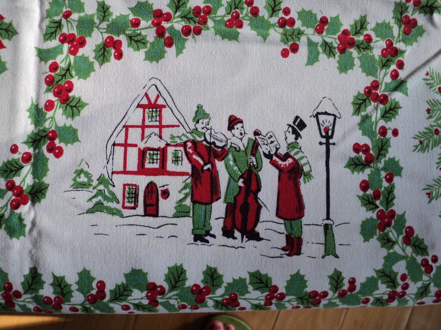 VINTAGE CHRISTMAS TABLECLOTH with Santa's Sleigh, Carolers, Pinecones and The Holly and Ivy