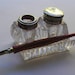 Vintage clear glass ink well - Rectangular with a starburst design