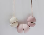 Pastel pink, nude pink and cream strand necklace - beadwork with handmade ceramic beads on a thin leather cord