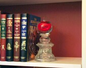 Book end. Paper weight.  "The Mighty Apple" is assembled sculpture made with repurposed vintage glass.