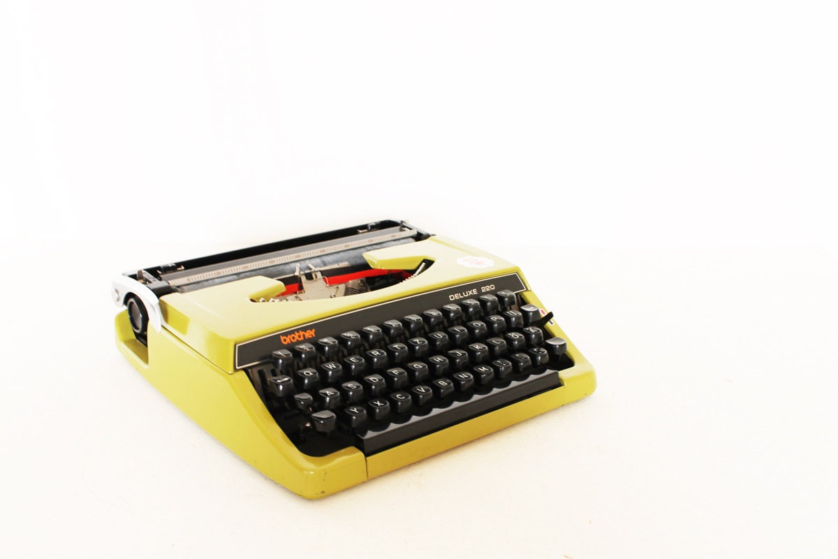 Vintage manual green deluxe typewriter