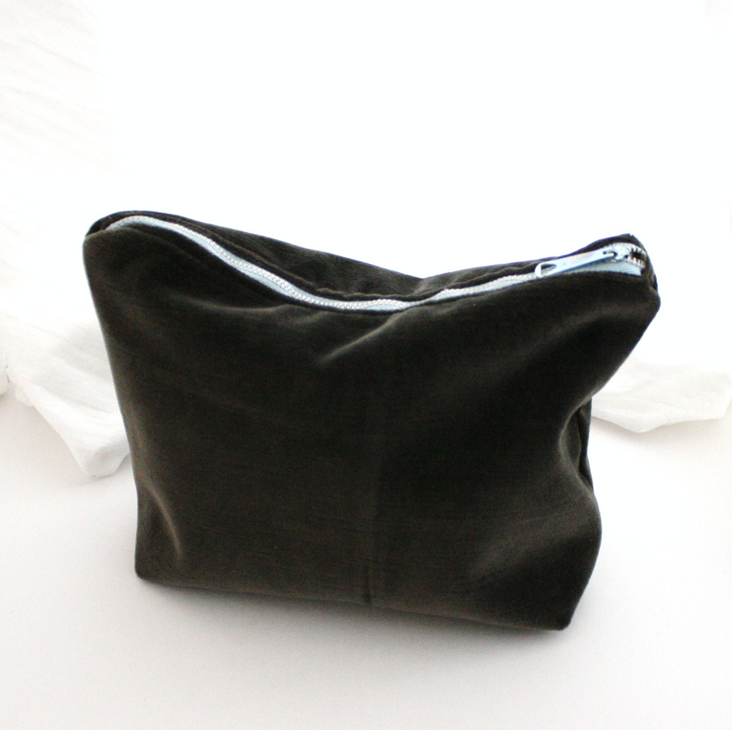 Brown velvet cosmetic pouch with gray blue accents and lining. 7 inches deep, 9 across. Travel cosmetics bag in brown and blue