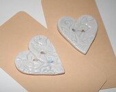 Chunky heart button, porcelain ceramic, ivy leaf impressed, pale celadon glaze, retro