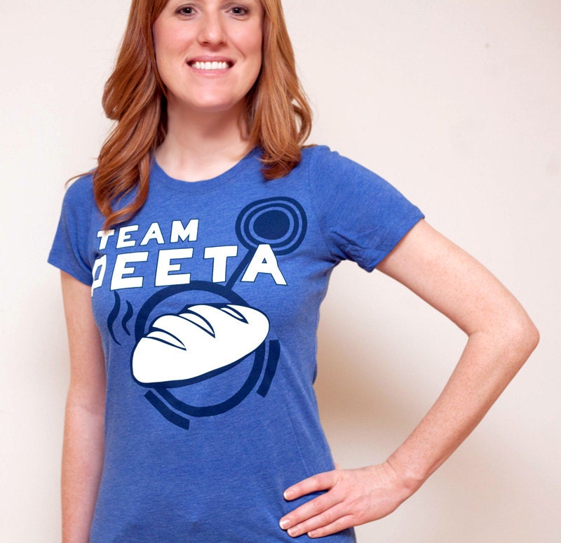 Women's Hunger Games Team Peeta T-Shirt with Bread Graphic, Blue, SIZE MEDIUM